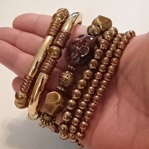 #1010.  6 Piece Assorted Gold Toned & Faux Stone Acrylic Stretch Bracelet Bundle